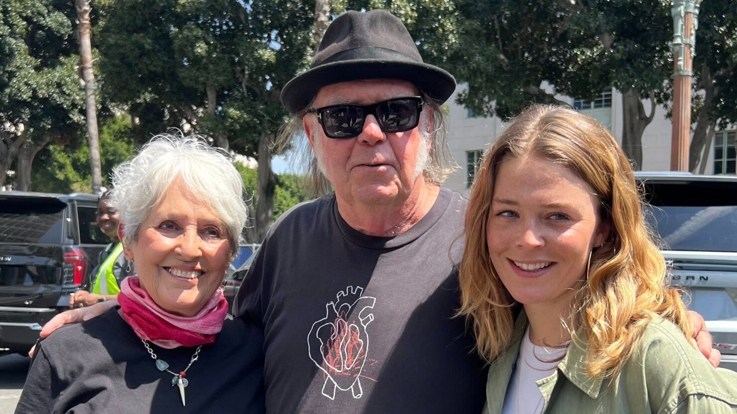Neil Young Joins Forces With Joan Baez & Maggie Rogers At 'Fighting Oligarchy' Rally In LA